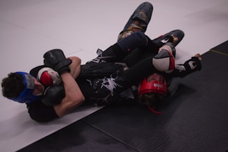 man in black and red boxing gloves