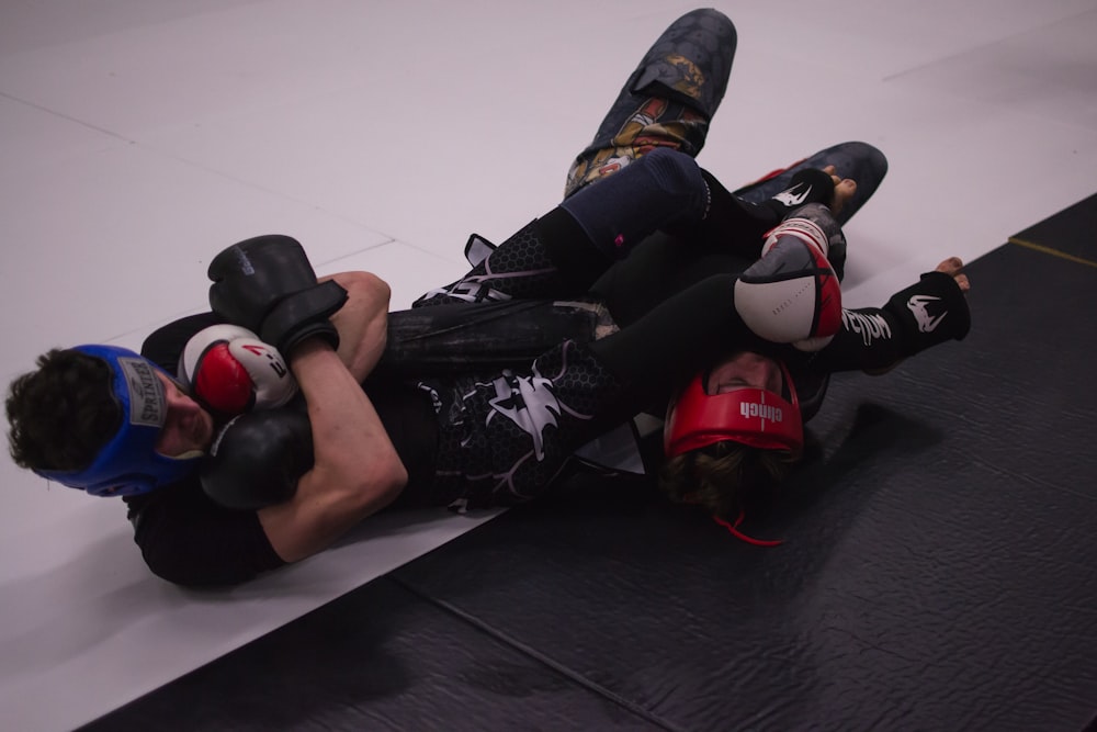 man in black and red boxing gloves