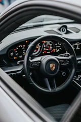 black and gray car steering wheel