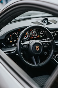 black and gray car steering wheel