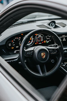 black and gray car steering wheel