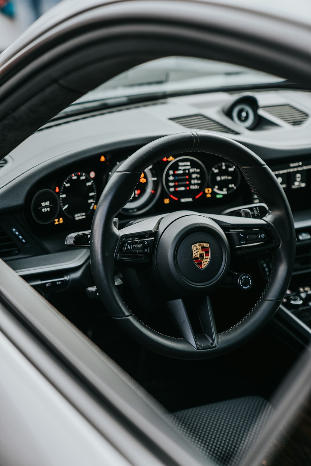 black and gray car steering wheel