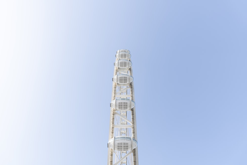 white and black tower under blue sky during daytime