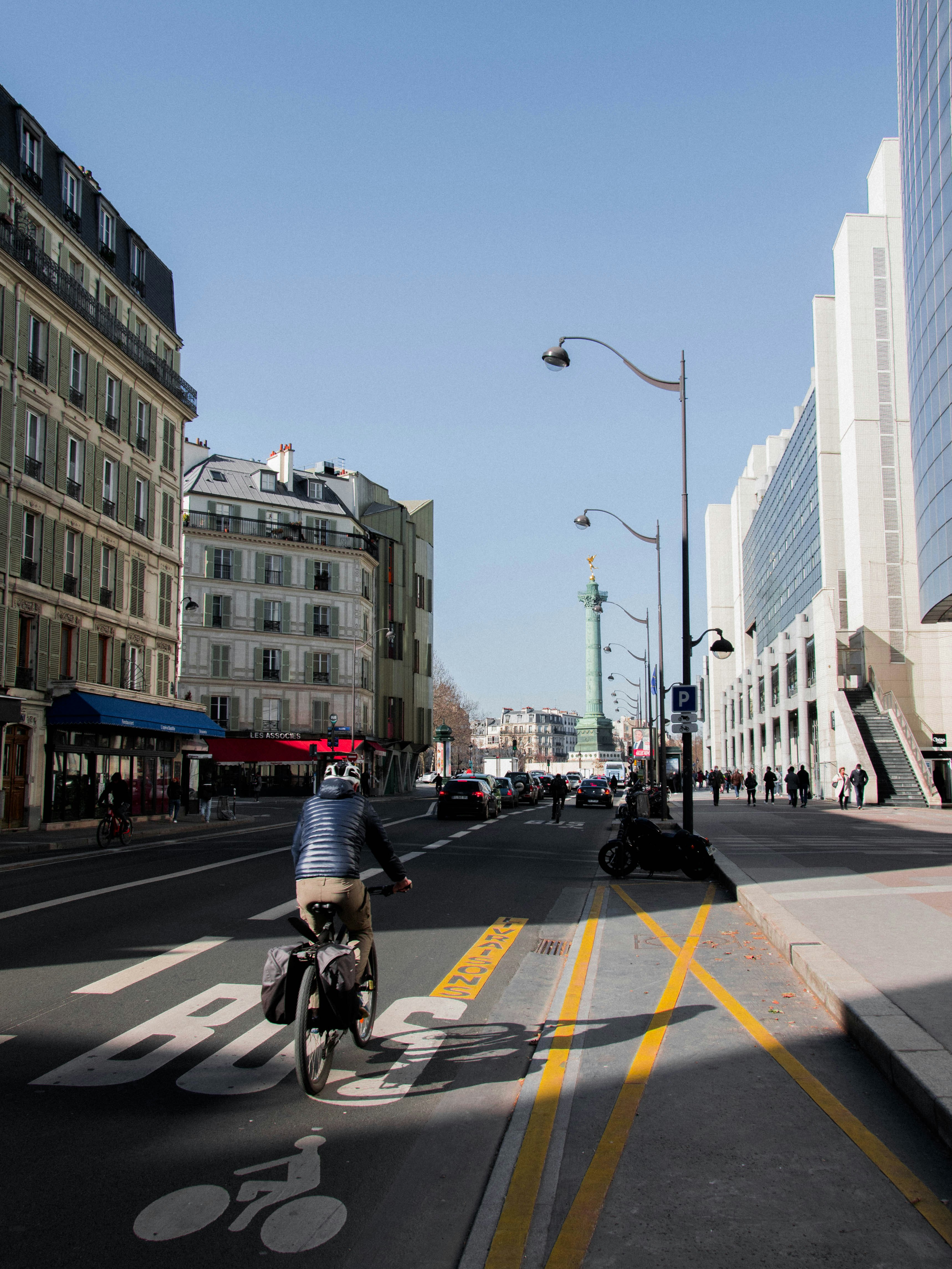 people riding motorcycle on road during daytime