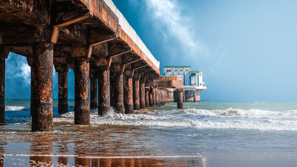 brown wooden dock on sea during daytime