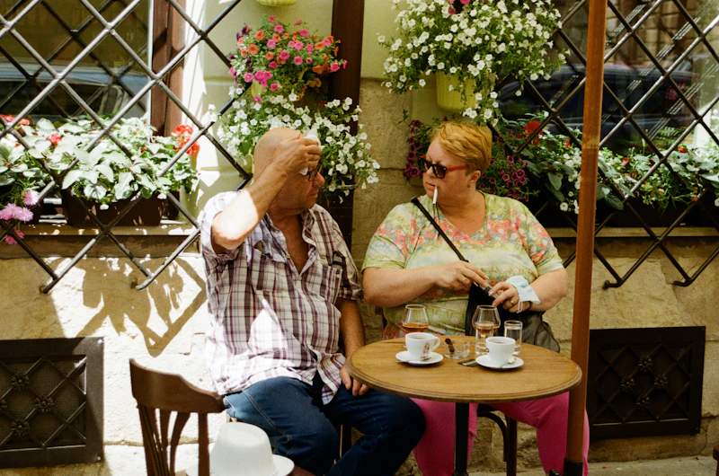 a man and a woman sitting at a table