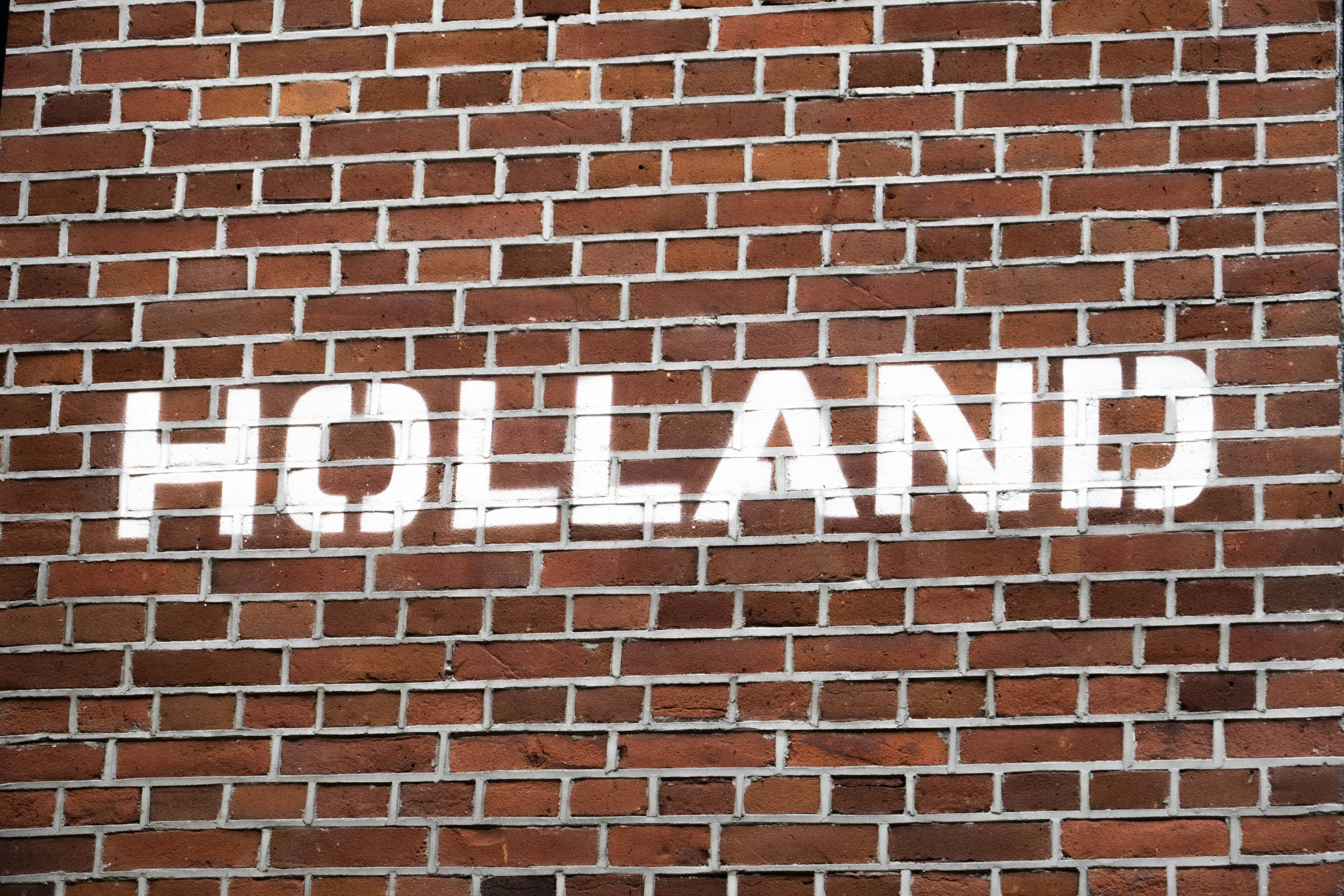 The word Holland on a brick wall in Assen