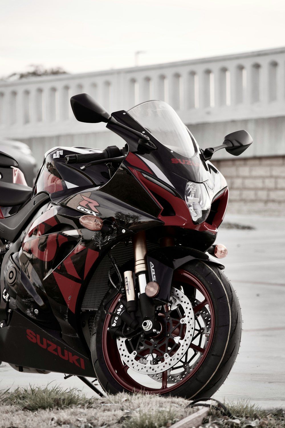 red and black sports bike