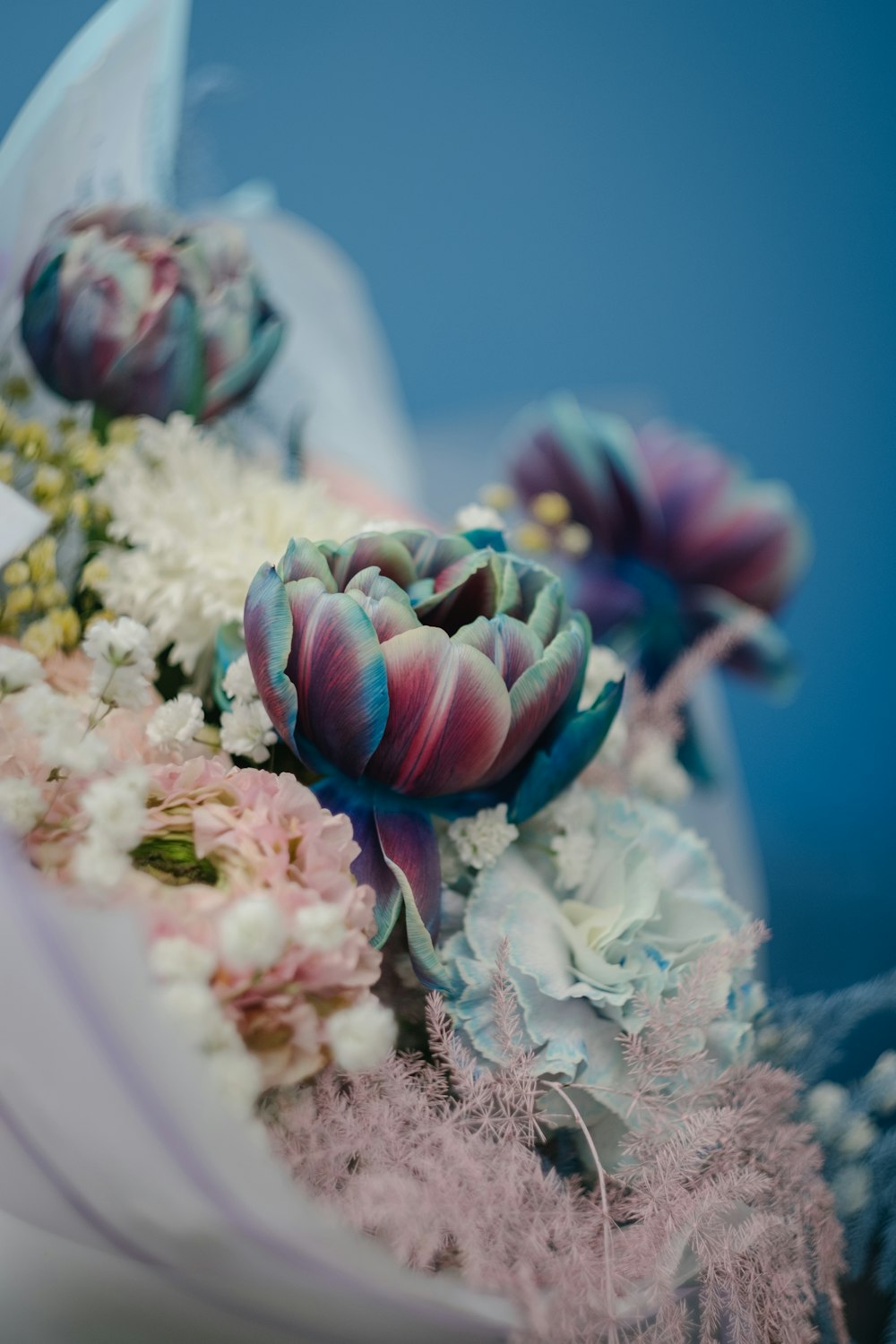 purple and white flower bouquet