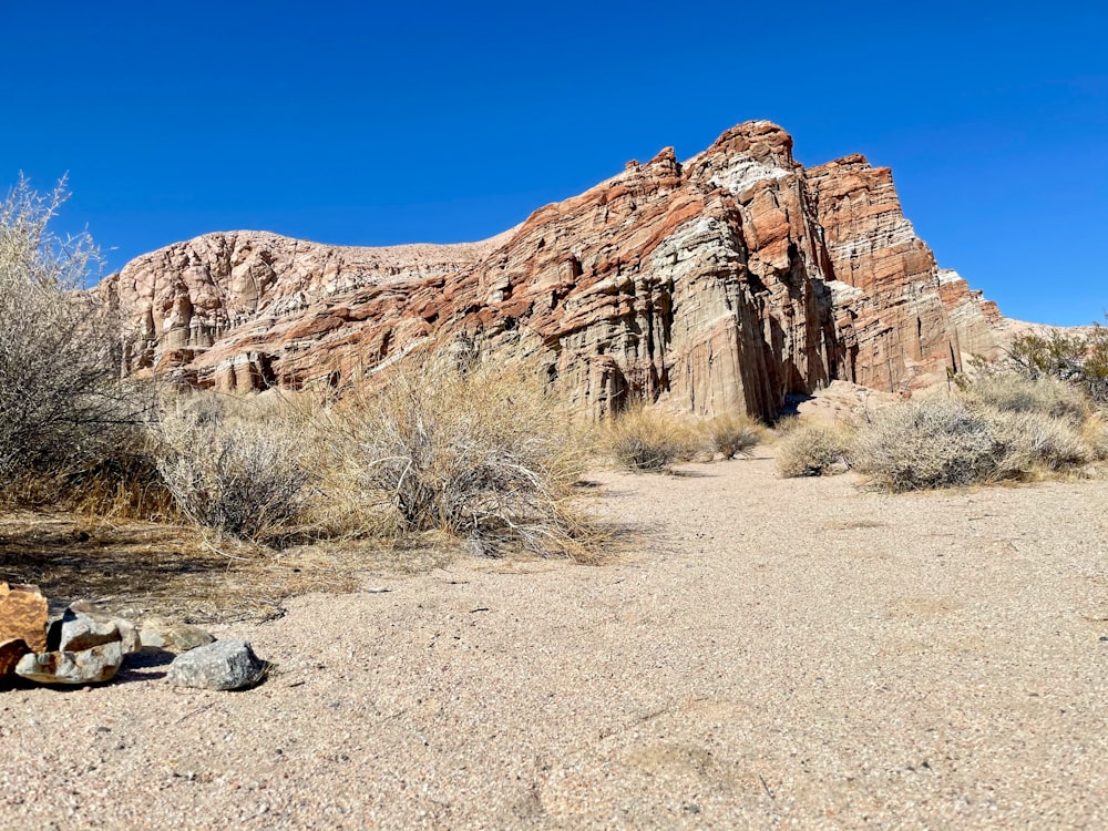 brown rock formation under blue sky during daytime