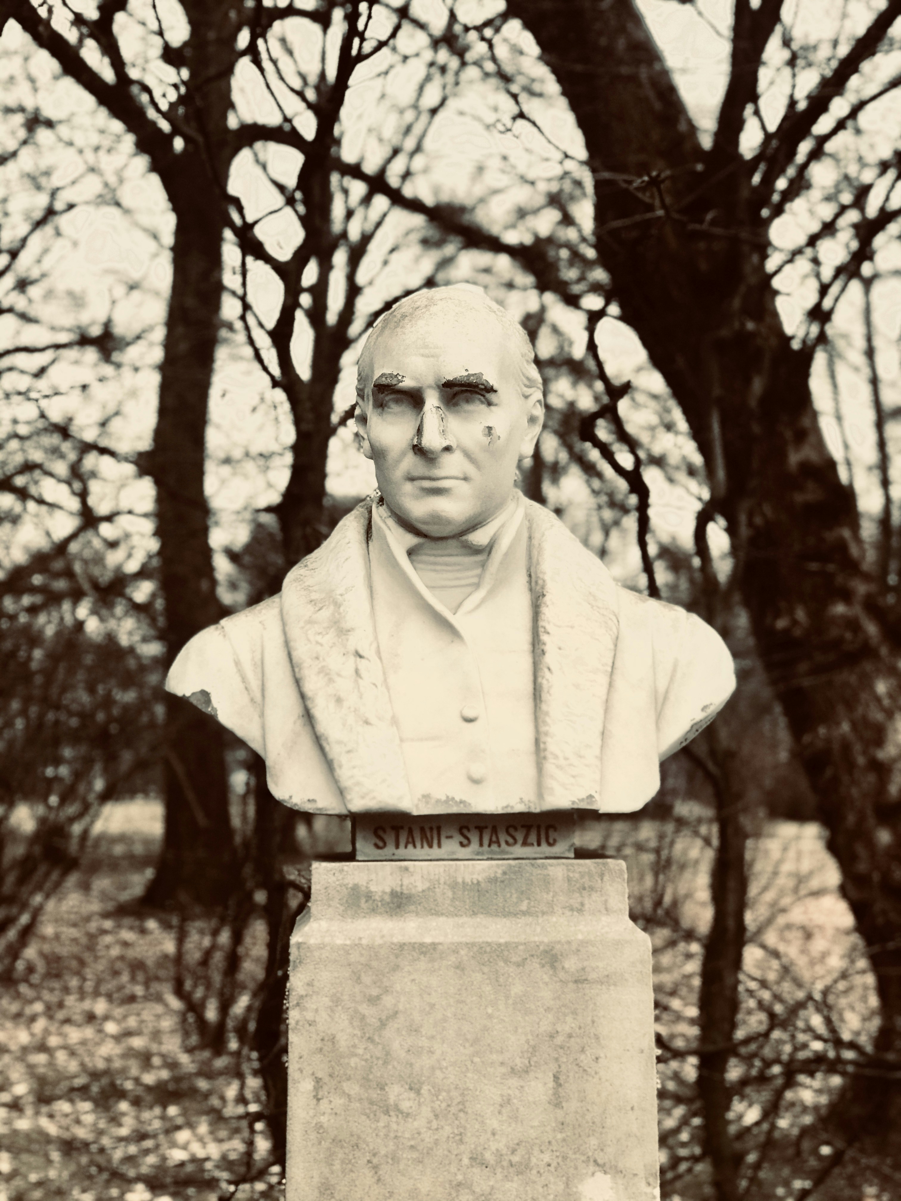 man in white dress shirt statue