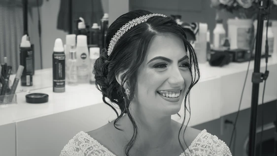 Portrait of Janice Hylton smiling warmly in her stylish Brampton salon.
