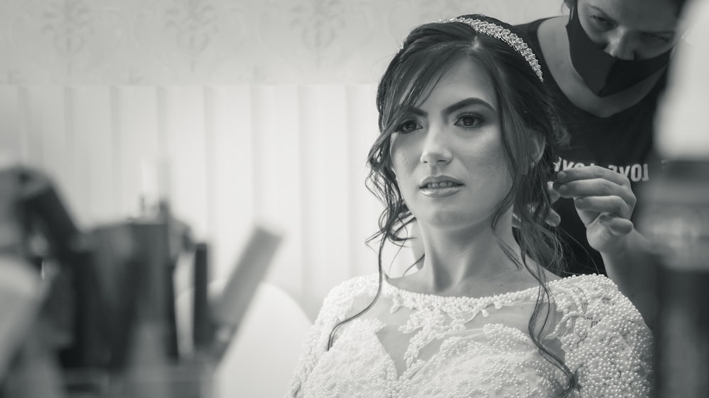 woman in white floral lace dress