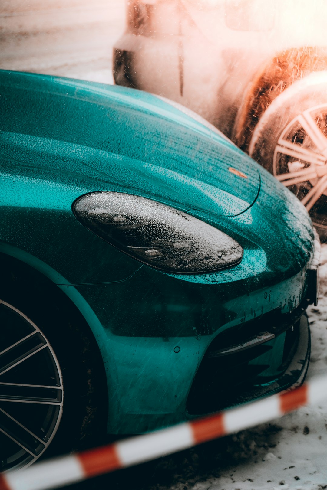 green car with chrome wheel