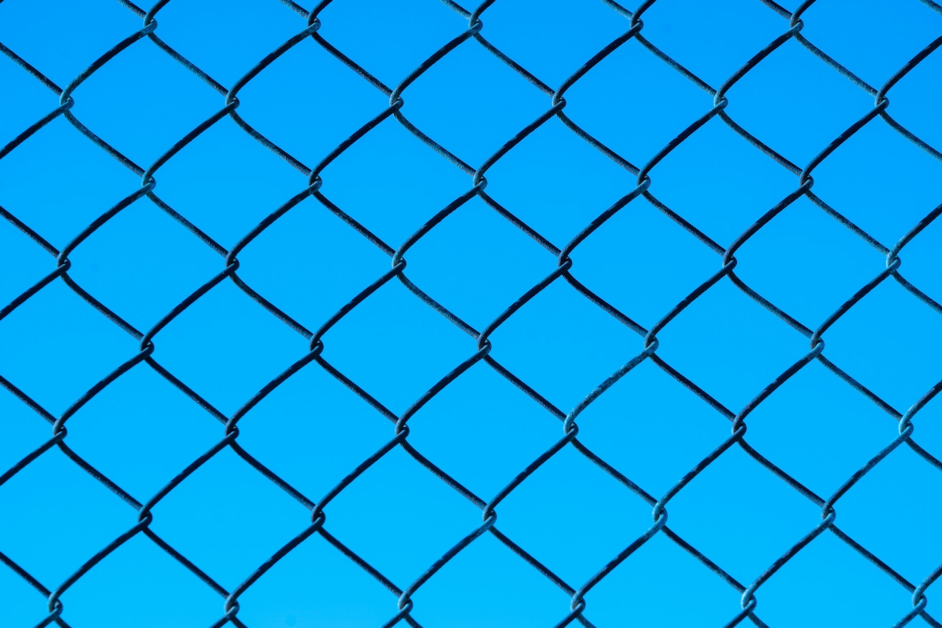 blue metal chain link fence
