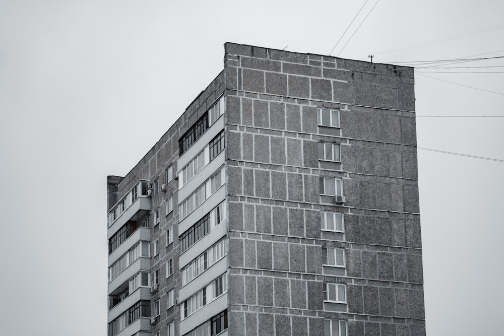 gray concrete building under white sky during daytime