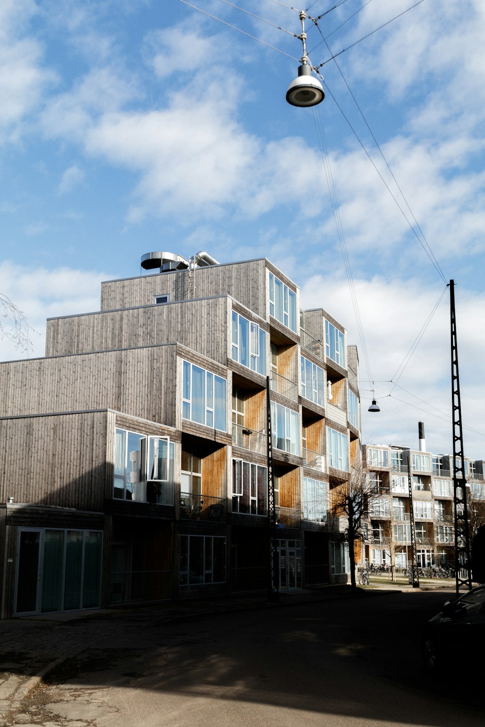 brown and gray concrete building under blue sky during daytime