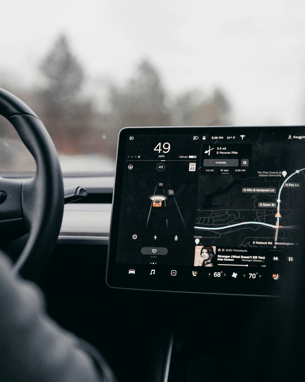 black and white map on car rear mirror