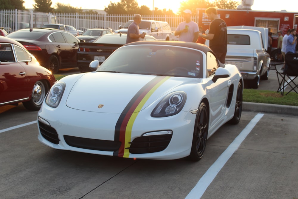 white porsche 911 on road during daytime