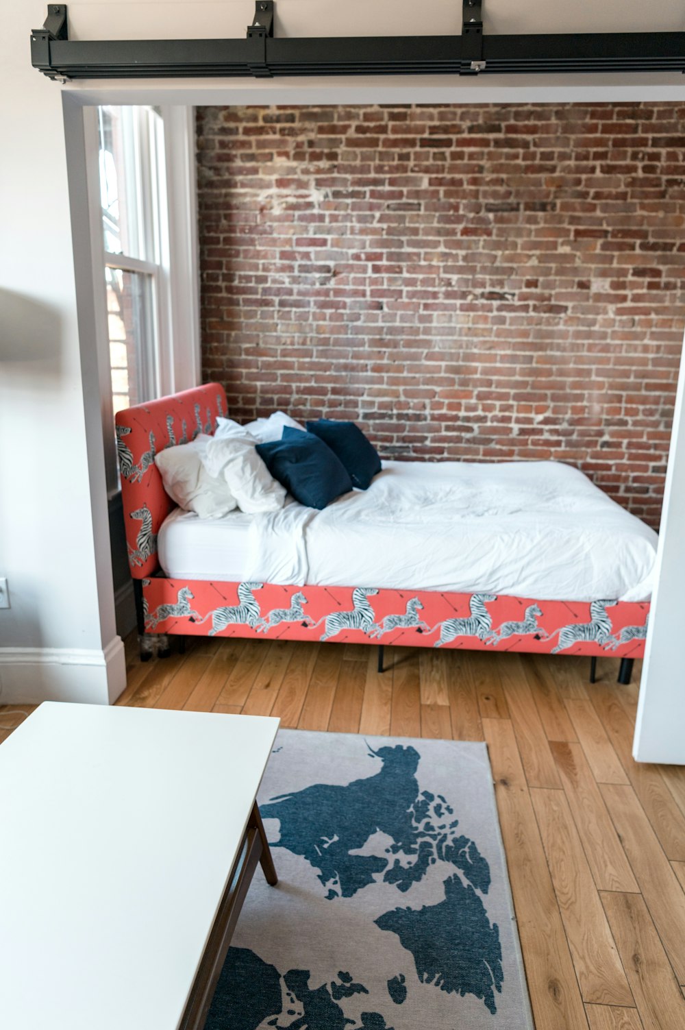 white and red floral bed linen