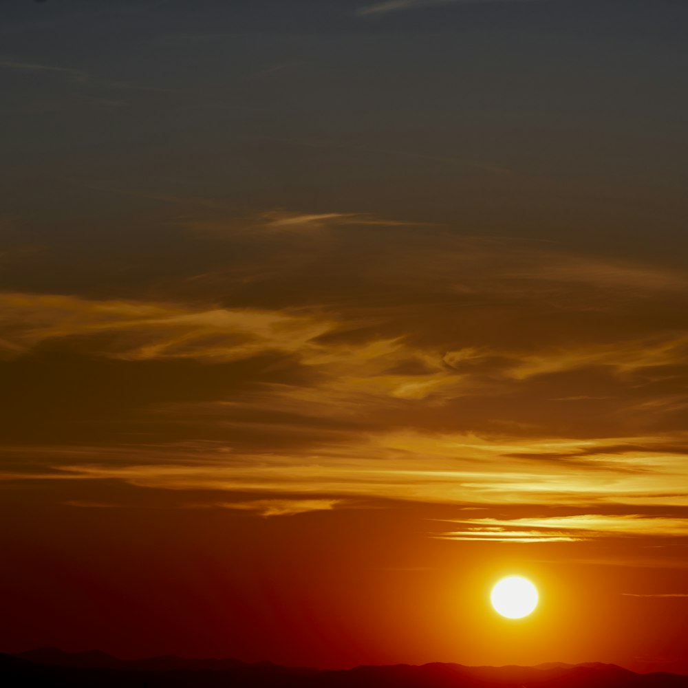 silhouette of mountain during sunset