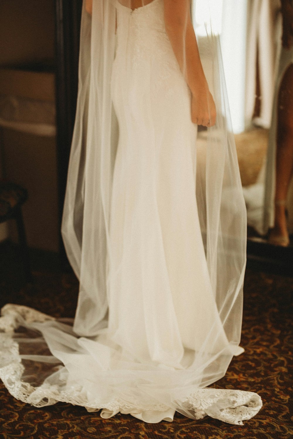 woman in white sleeveless dress