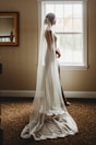 white sheer window curtain on window