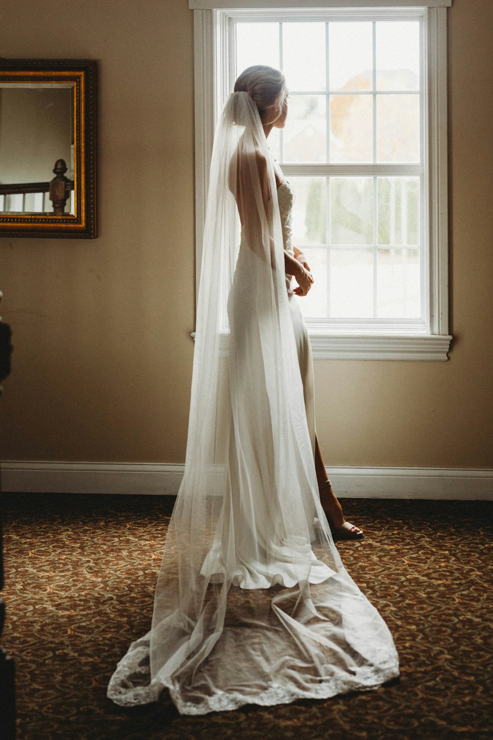 white sheer window curtain on window