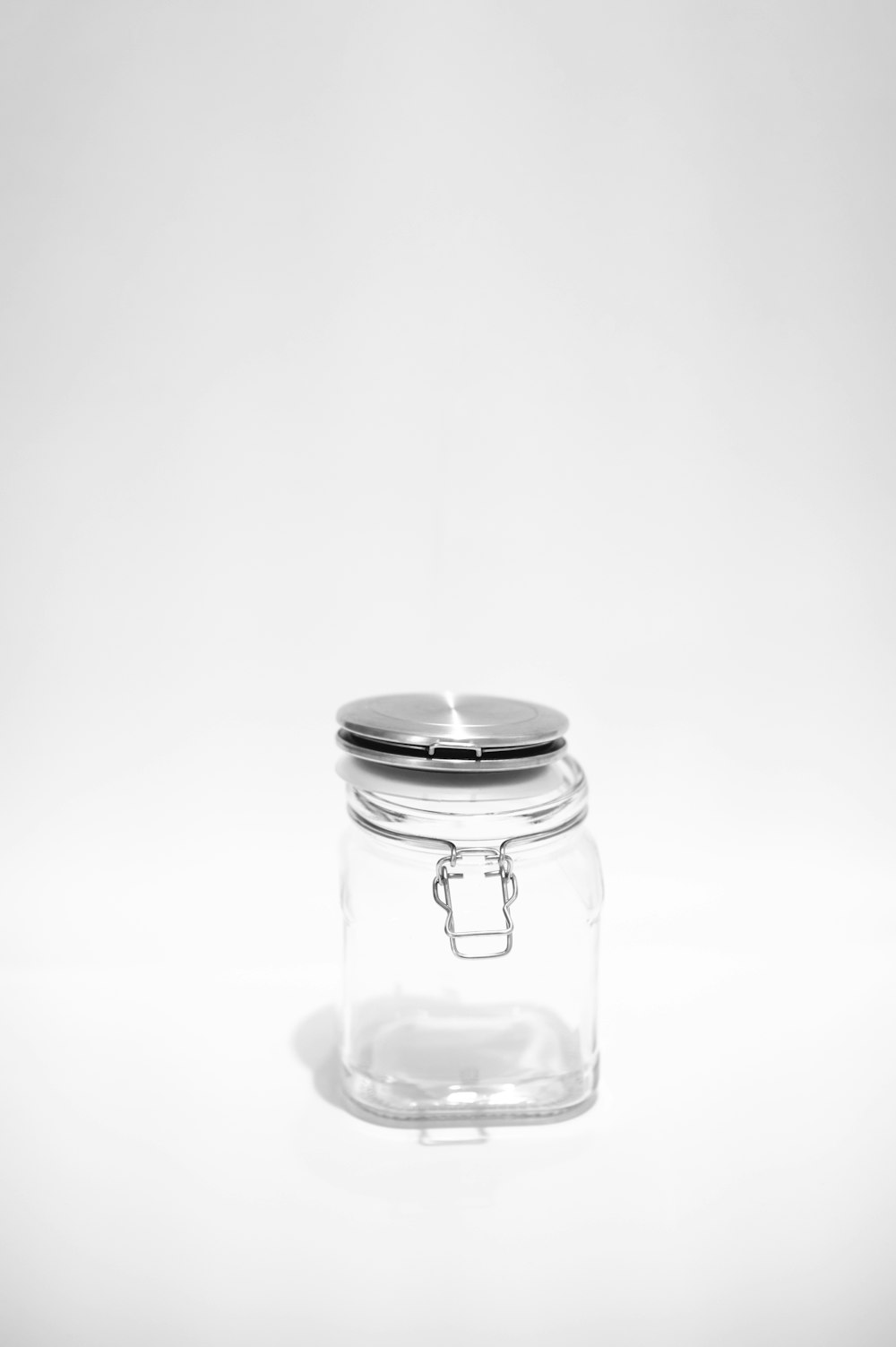 clear glass jar with white background