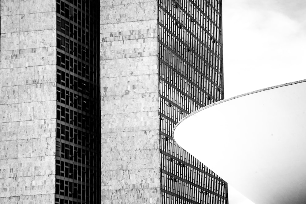 grayscale photo of high rise building