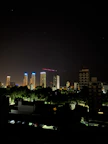 city skyline during night time
