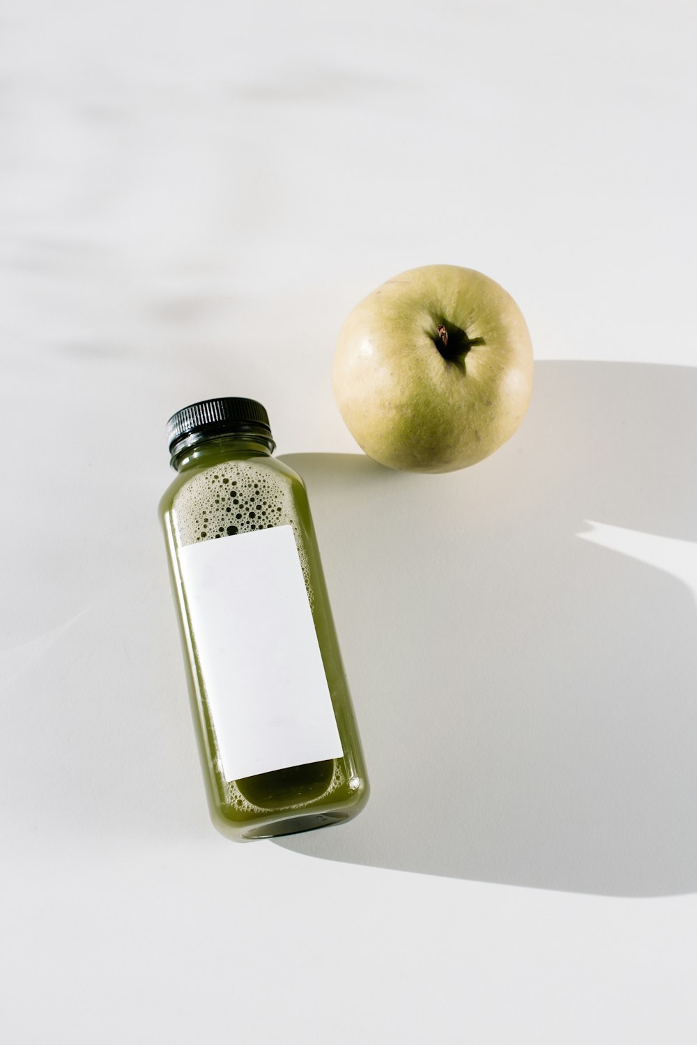 apple fruit on white table