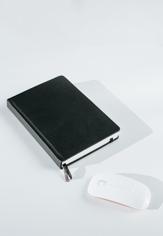 black ipad on white table