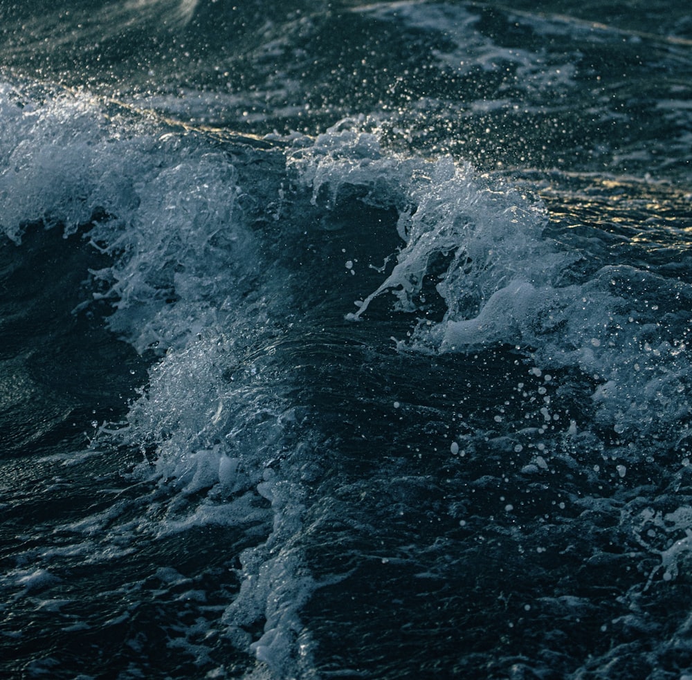 water waves hitting the shore