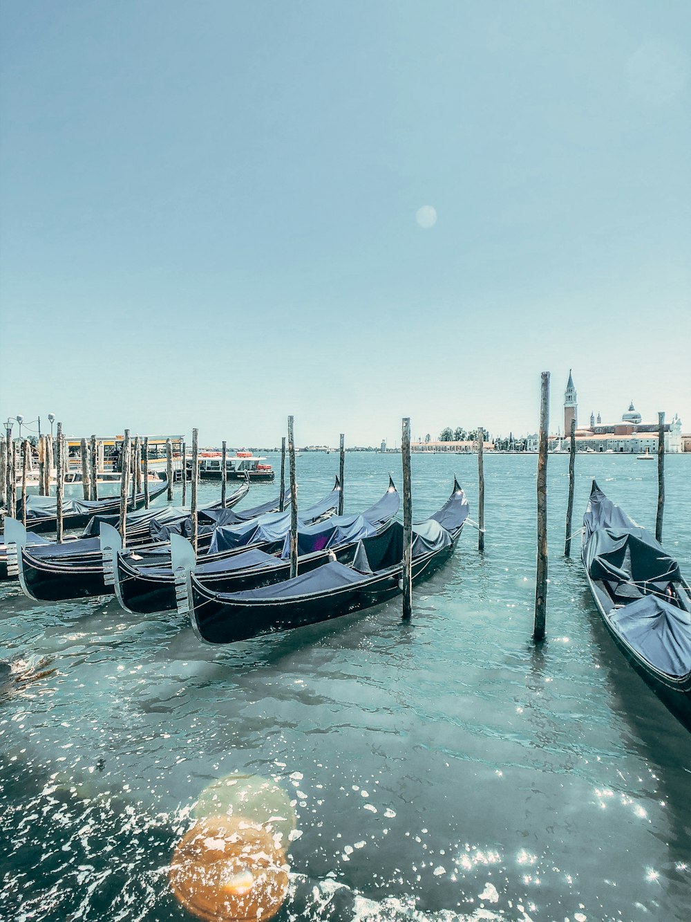 white and blue boat on water during daytime