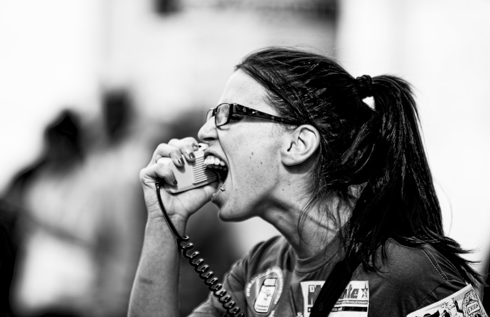 grayscale photo of woman wearing sunglasses