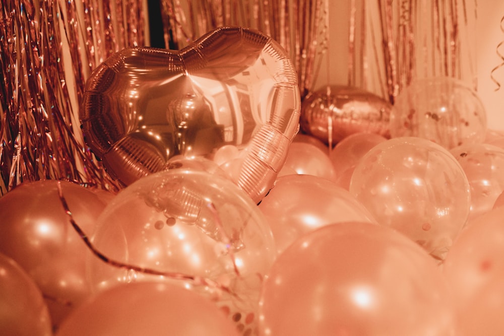 clear glass ball decors on brown wooden table