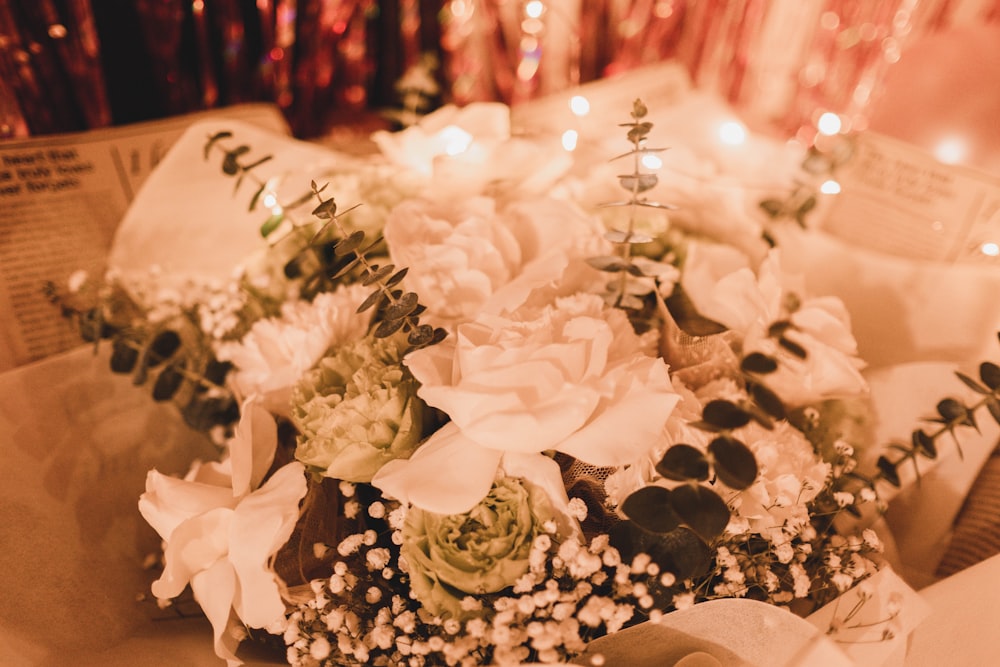 white flower bouquet on white table