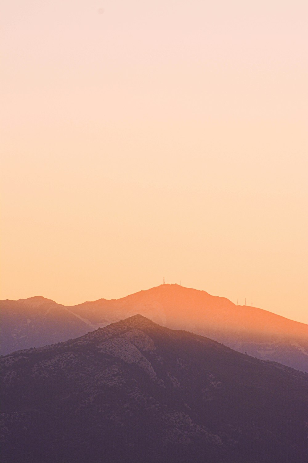 silhouette of mountains during sunset