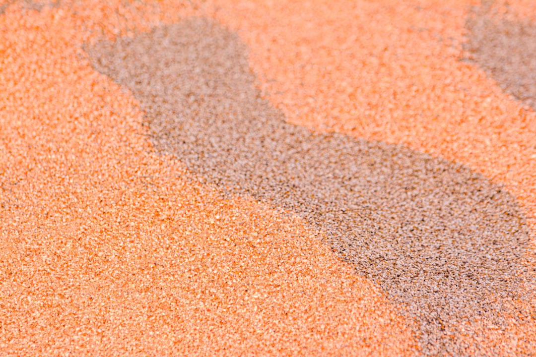 brown and white sand during daytime