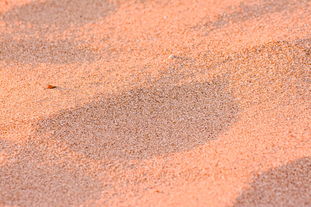 brown and white sand during daytime