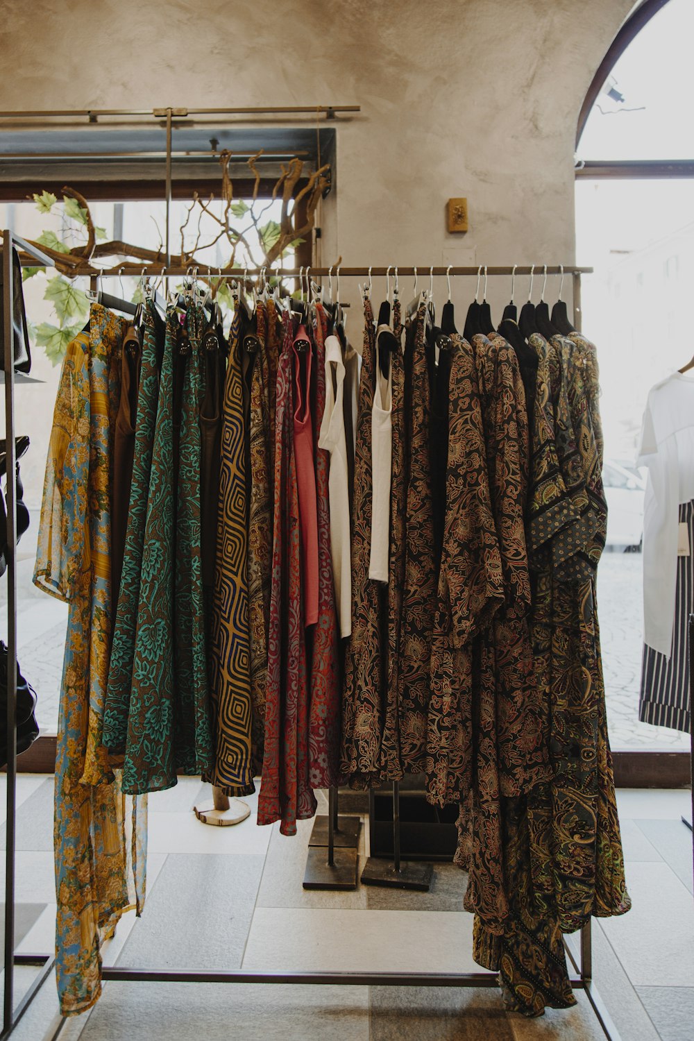 brown and green floral robe