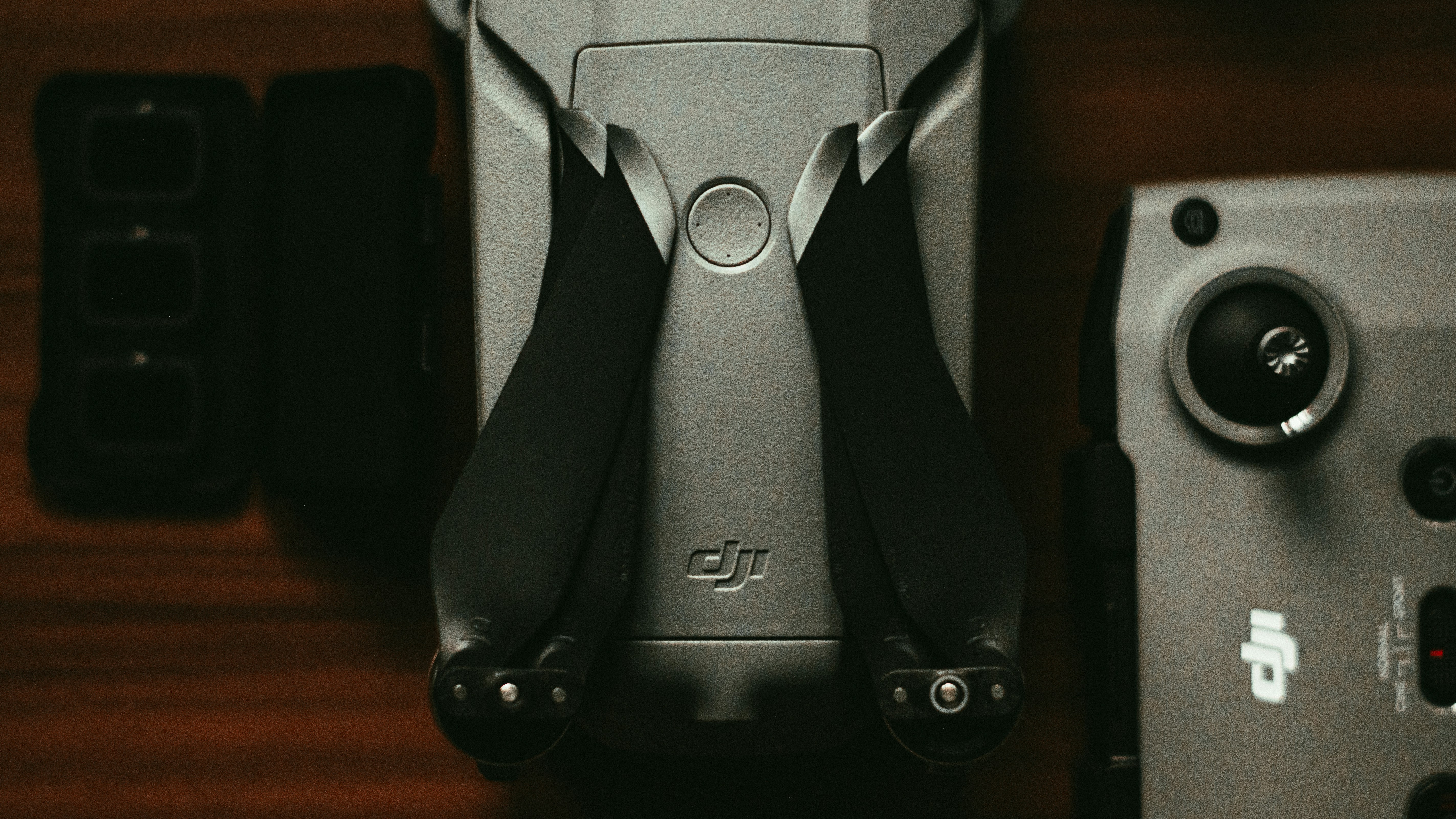 black and gray backpack on brown wooden table, 