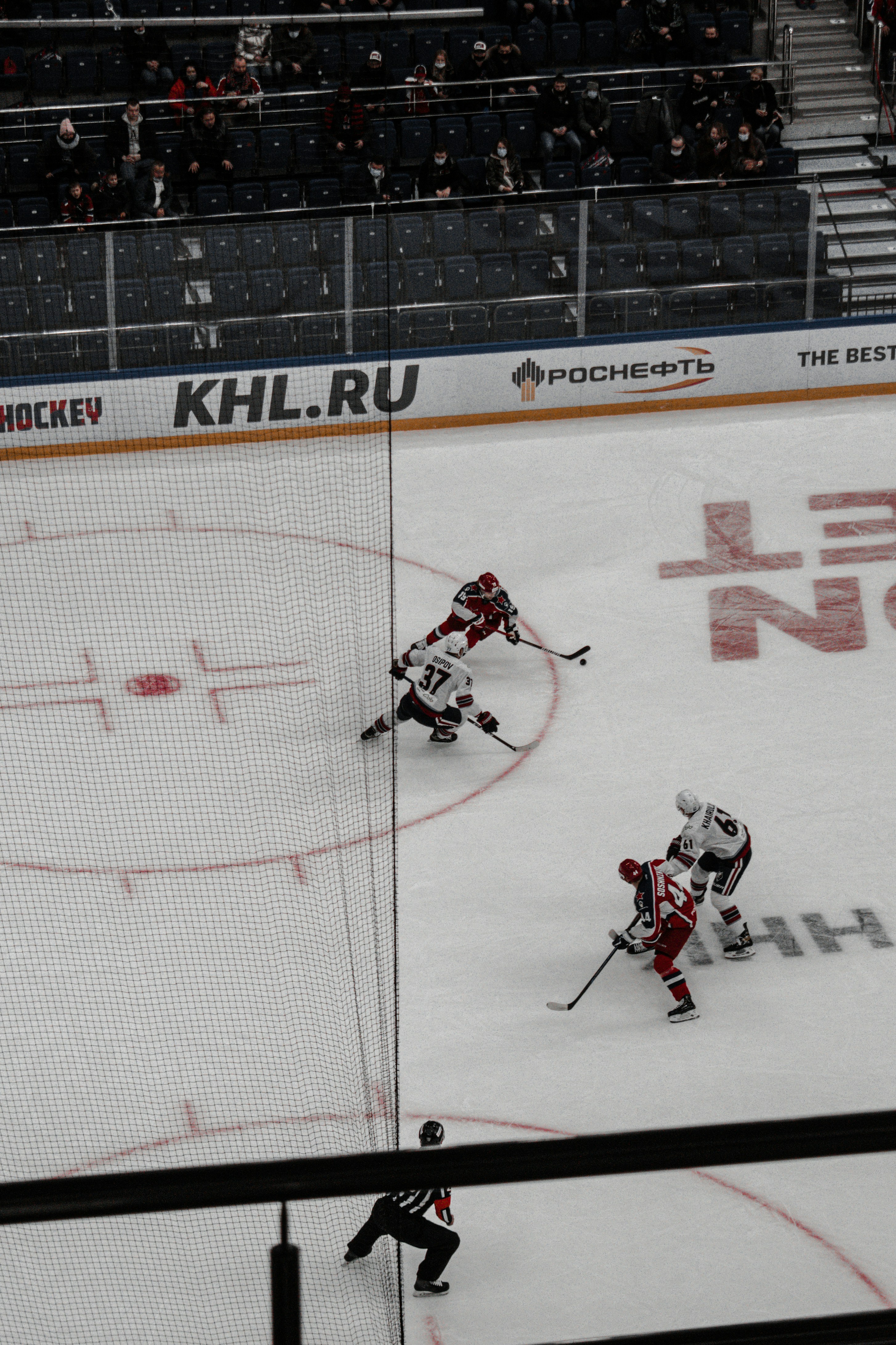 ice hockey players on ice hockey field