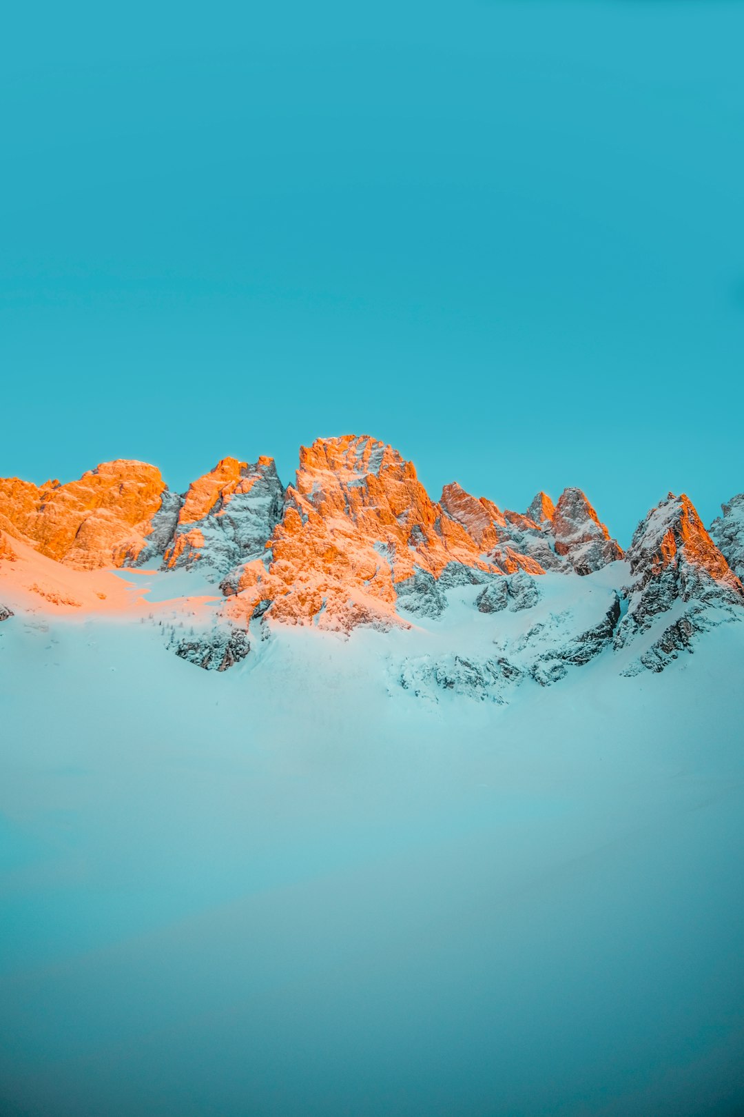 snow covered mountain during daytime