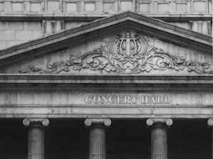 grayscale photo of concrete building
