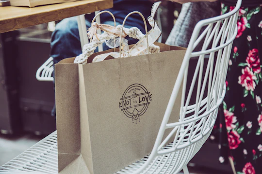 brown cardboard box on white plastic basket