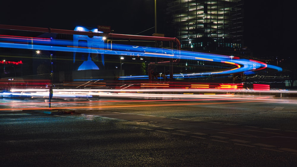 time lapse photography of cars on road during night time