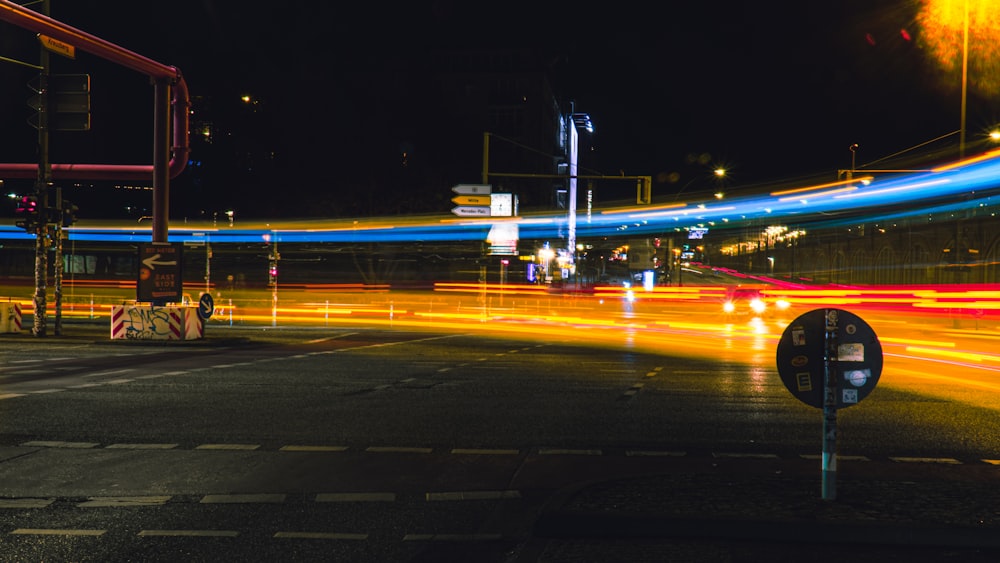 time lapse photography of cars on road during night time