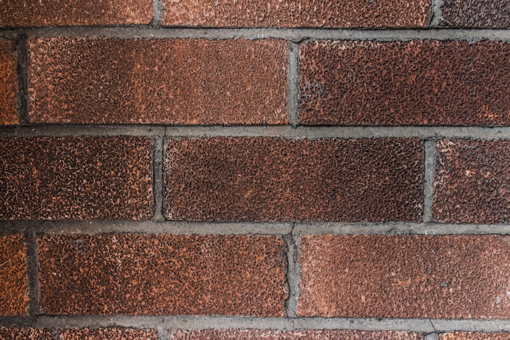 brown and gray brick wall